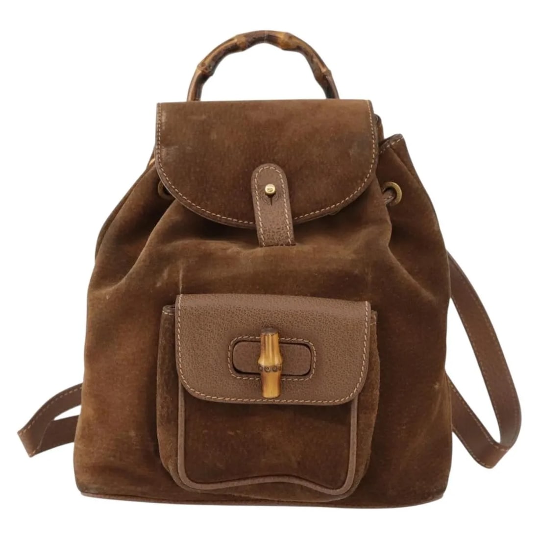 Gucci Bamboo Backpack Brown Suede Bag Made in Italy: Gucci Bamboo Backpack Brown Suede Bag Made in Italy This Gucci bamboo backpack is crafted from brown suede and designed specifically for women. It features the iconic bamboo handle and adjustable shou