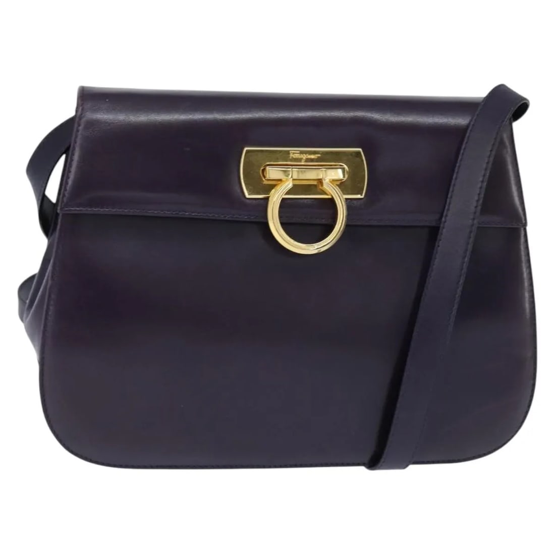 Navy Leather Shoulder Bag Salvatore Ferragamo Gancini: Navy Leather Shoulder Bag Salvatore Ferragamo Gancini This Salvatore Ferragamo Gancini shoulder bag features a navy leather exterior and is designed for women. The bag shows signs of use, including ru