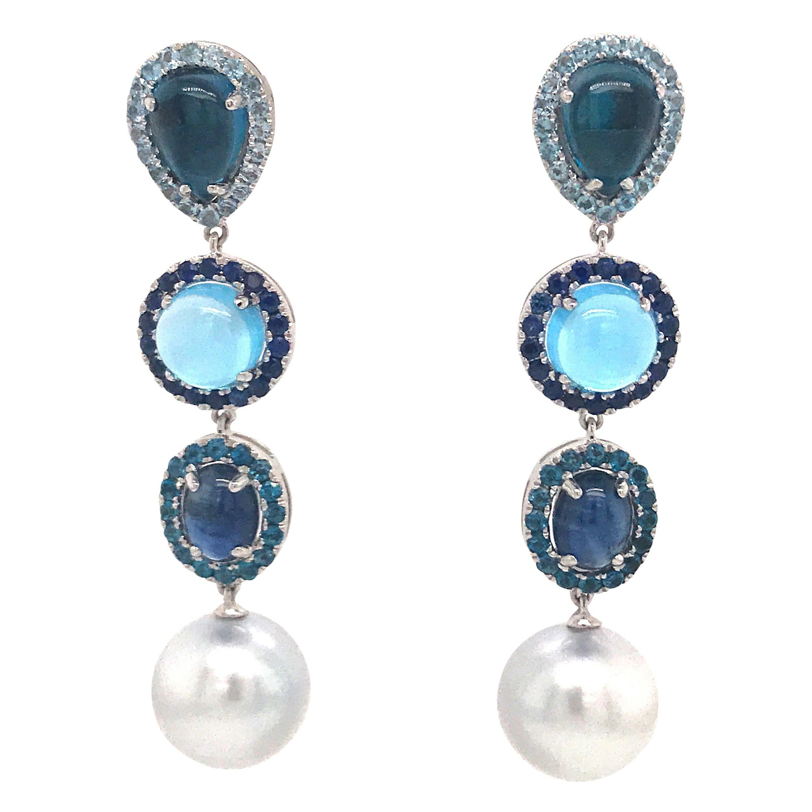 Harbor Diamonds 18K White Gold Blue Topaz Sapphire Pearl Drop Earrings: Harbor Diamonds 18K White Gold Blue Topaz Sapphire Pearl Drop Earrings These exquisite drop earrings showcase a stunning combination of 18K white gold, blue topaz, sapphires, and South Sea pearls. Fea