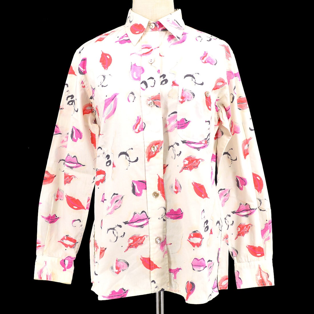 Chanel Lip Print Cotton Button Up Collared Long Sleeve Shirt: Chanel Lip Print Cotton Button Up Collared Long Sleeve Shirt CHANEL women's button-up long sleeve top in white cotton with a lips pattern design. This collared shirt features a front button closure an