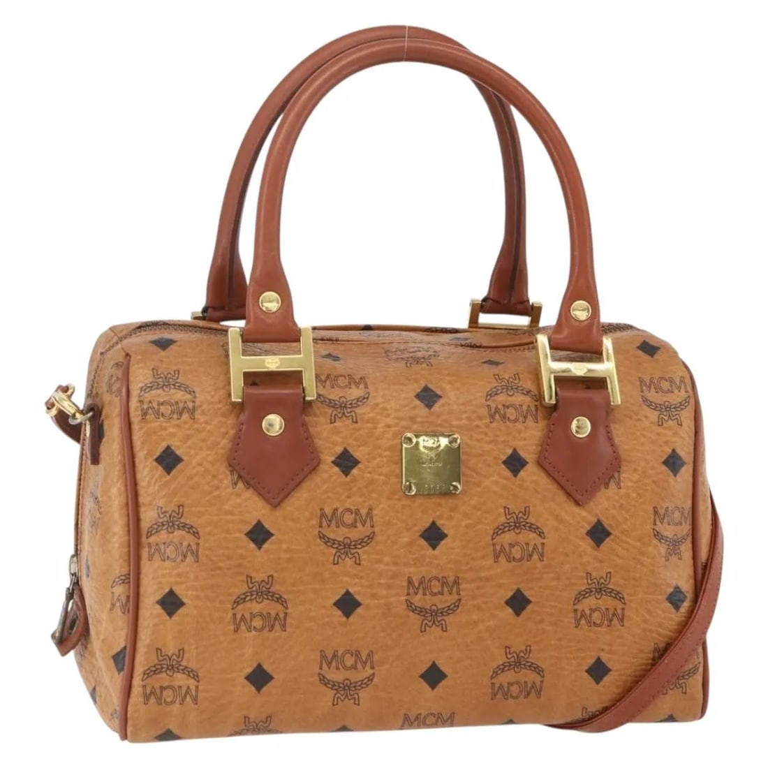Brown Canvas and Leather Visetos Handbag by MCM 26cm: Brown Canvas and Leather Visetos Handbag by MCM 26cm This pre-owned MCM Visetos logogram handbag features a brown canvas construction with leather accents. Designed for women, the handbag offers a com