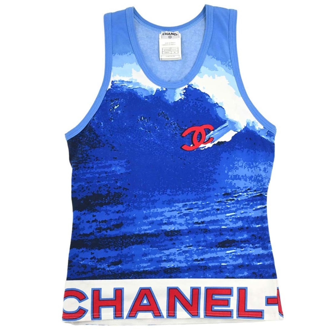 CHANEL Surf Line Blue Cotton Spandex Tank Top 02S: CHANEL Surf Line Blue Cotton Spandex Tank Top 02S Chanel Surf Line sleeveless tank top in blue and white, made from 92% cotton and 8% spandex. It features a round neckline, regular fit, and logo accen