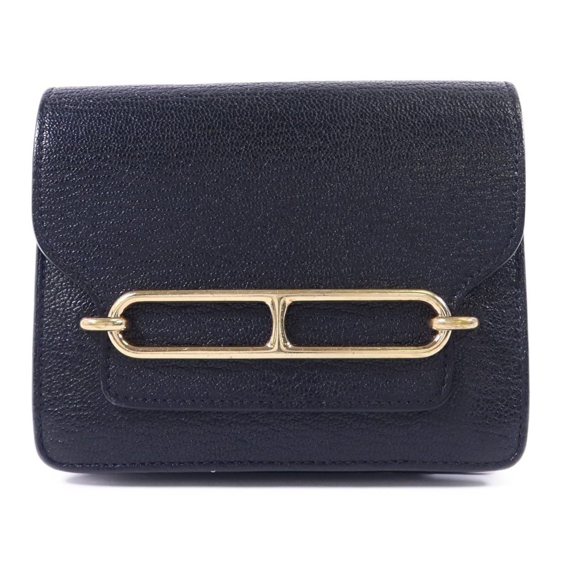 Hermes Roulis Slim bifold wallet in black Chevre Mysore leather: Hermes Roulis Slim bifold wallet in black Chevre Mysore leather Hermes Roulis Slim Wallet in Chevre Mysore goatskin leather, presented in Noir black. This bi-fold wallet features a flap closure, two o