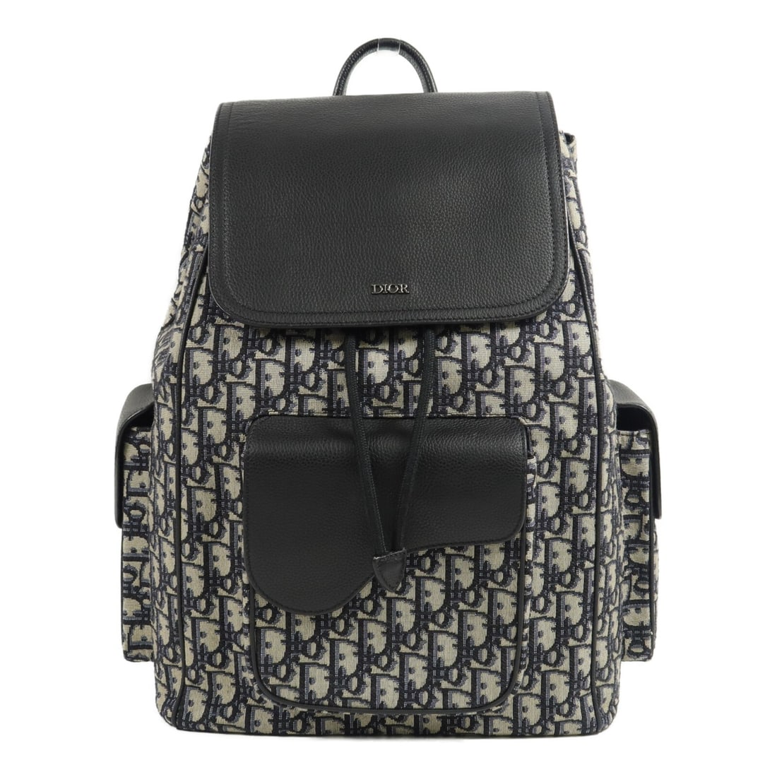 Dior Saddle Backpack CD SHW Navy Black Canvas Calfskin: Dior Saddle Backpack CD SHW Navy Black Canvas Calfskin A Christian Dior Saddle Backpack in navy/black canvas and calfskin leather. It features a flap design, multiple zip pockets, and an open interior