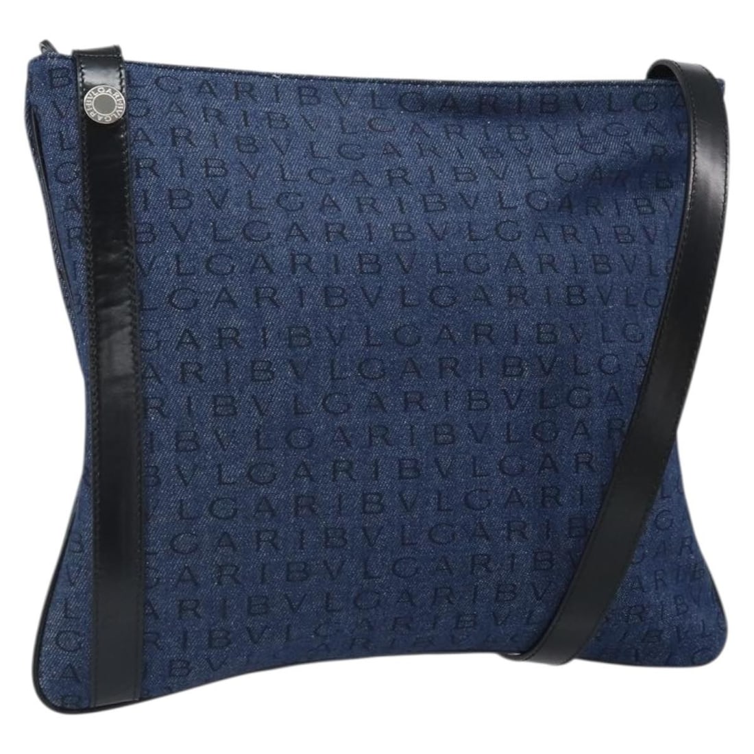 Blue Canvas Logo Mania Shoulder Bag by BVLGARI Italy: Blue Canvas Logo Mania Shoulder Bag by BVLGARI Italy This BVLGARI Logo Mania shoulder bag features a blue and silver canvas exterior and is crafted in Italy. The bag is in excellent, un-used condition