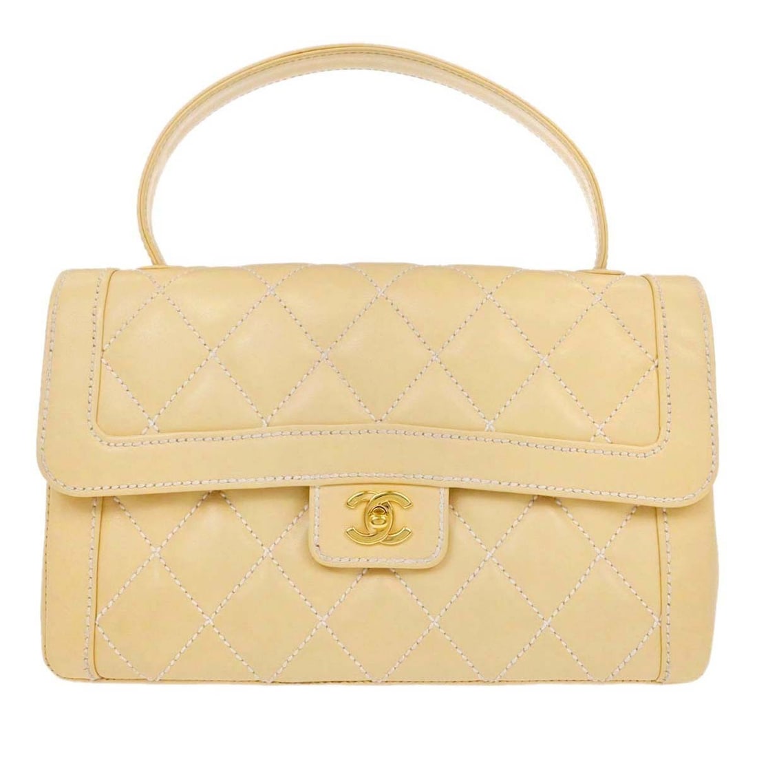CHANEL Wild Stitch Beige Calfskin Medium Handbag Turn Lock: CHANEL Wild Stitch Beige Calfskin Medium Handbag Turn Lock Chanel Wild Stitch handbag in beige calfskin with a turn-lock closure and logo accent. This medium handbag features a leather handle and an e