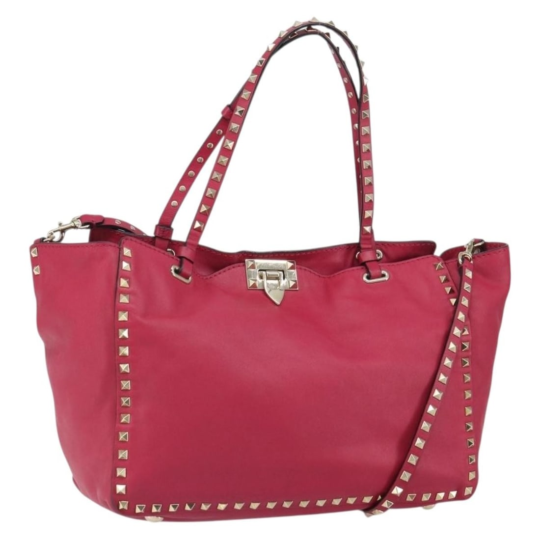 Valentino Rockstud Leather Tote Bag Pink Gold 2 Way Strap: Valentino Rockstud Leather Tote Bag Pink Gold 2 Way Strap Valentino Rockstud tote bag in pink and gold leather with a 2-way design. It comes with a shoulder strap and was made in Italy. The bag shows 