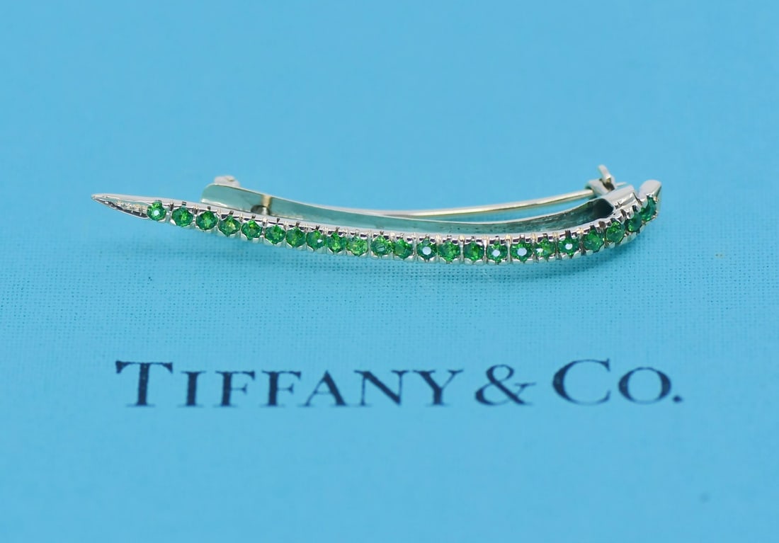 Tiffany & Co. Tsavorite 14K Gold Signed Brooch Pin: Tiffany & Co. Tsavorite 14K Gold Signed Brooch Pin Tiffany & Co. tsavorite brooch in 14K yellow gold, featuring a natural main stone with no enhancement. The piece is signed, vintage, and made in the 