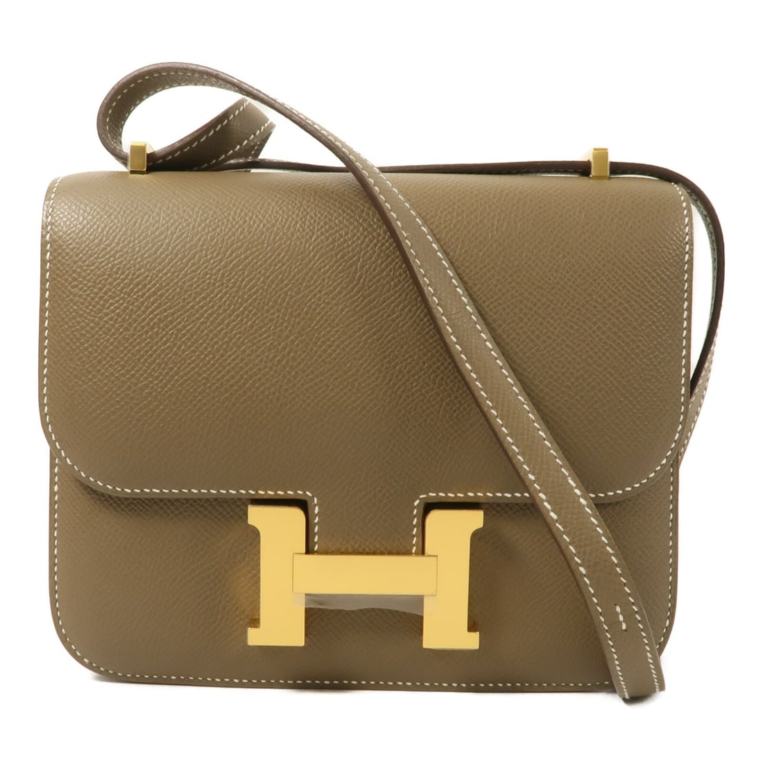 Hermes Constance Mini Epsom Calfskin Shoulder Bag Etoupe: Hermes Constance Mini Epsom Calfskin Shoulder Bag Etoupe A Hermes Constance Mini shoulder bag in Etoupe Grey, crafted from Epsom leather and calfskin (cowhide). It features gold hardware, a magnetic p