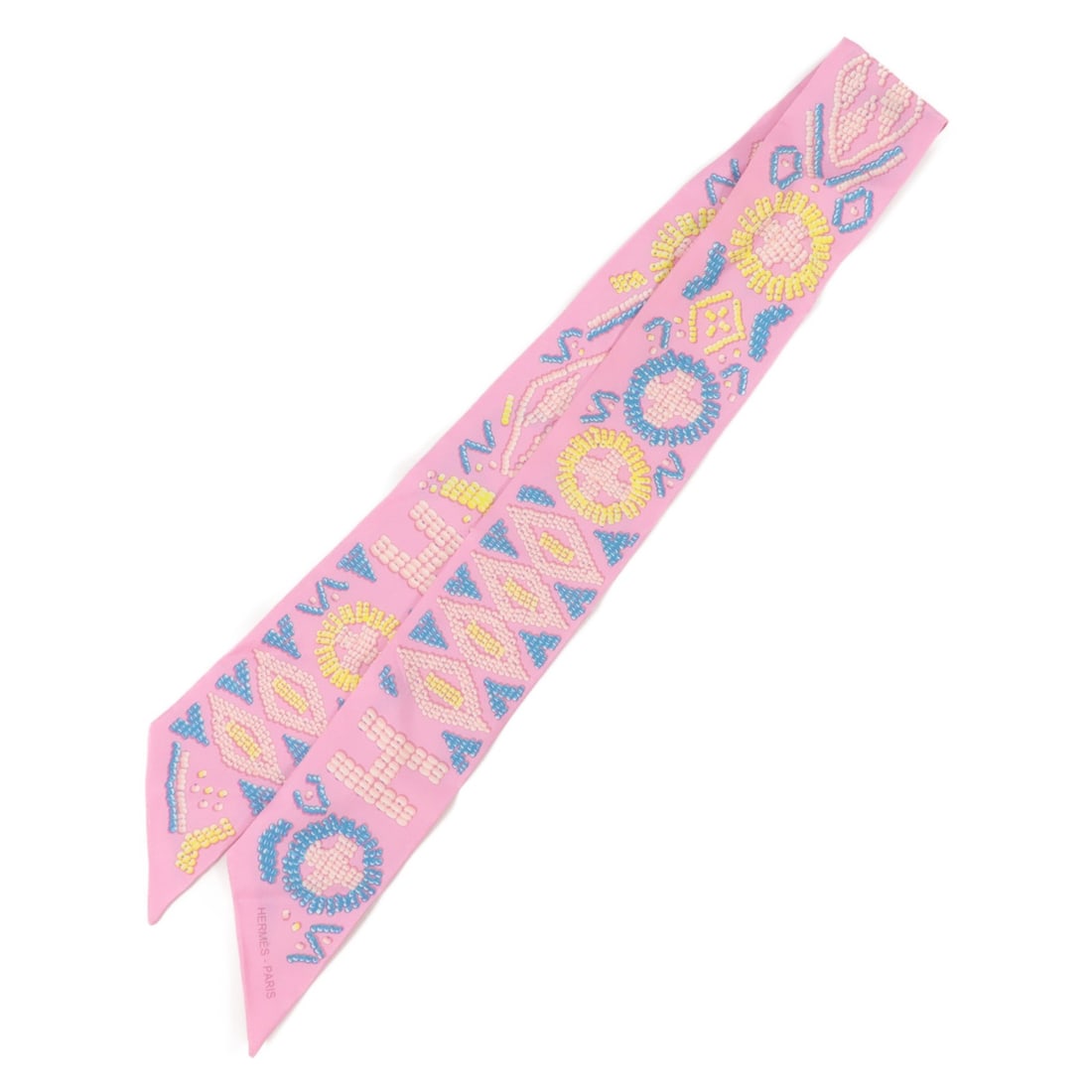 Hermes Twilly Silk Scarf Pink 85cm x 5cm: Hermes Twilly Silk Scarf Pink 85cm x 5cm Hermes Twilly scarf in pink silk. The item is described as having a silk x silk construction and measures 85 cm x 5 cm (33.5 in x 2.0 in). Condition is B: reas