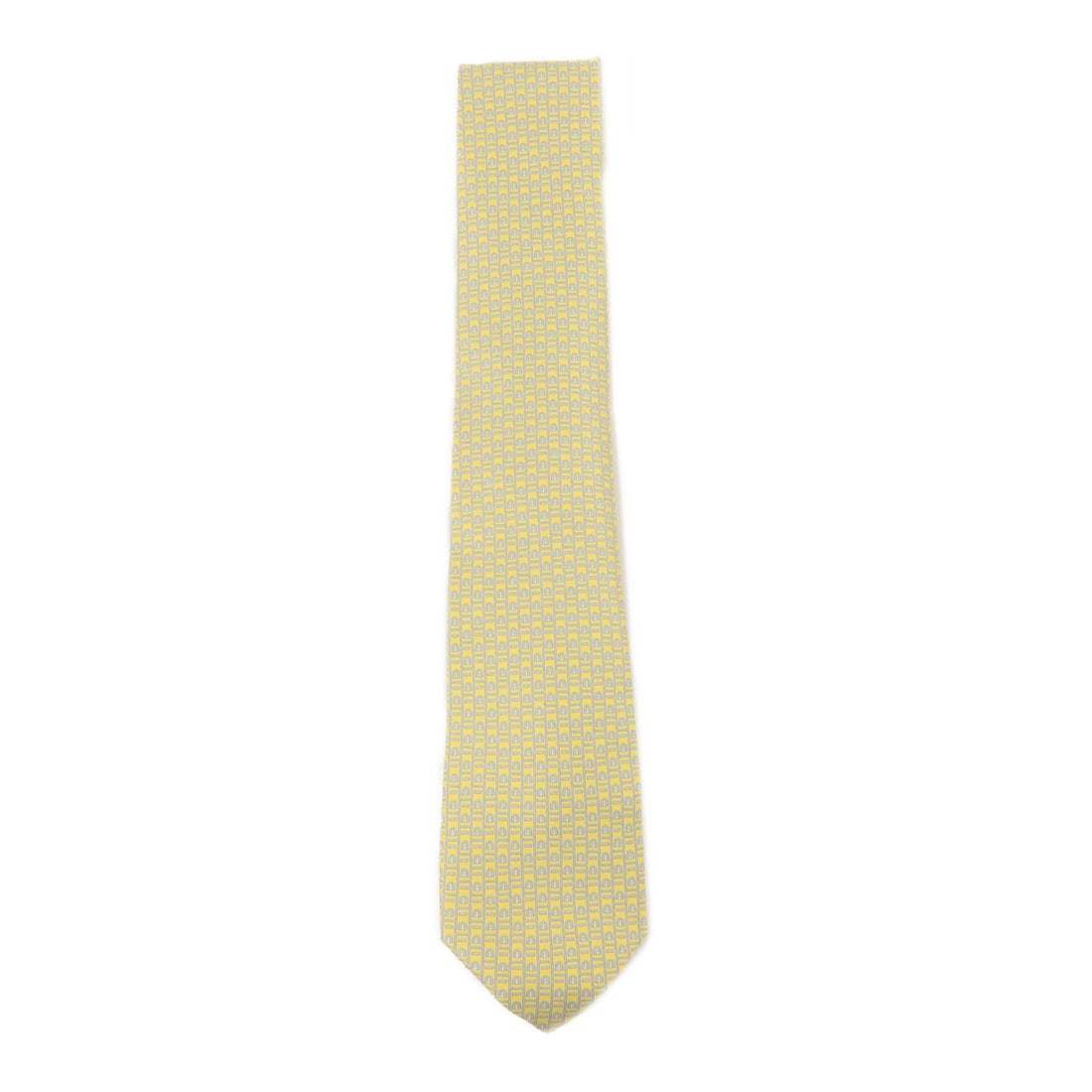 Salvatore Ferragamo Yellow Silk Necktie with Storage Box: Salvatore Ferragamo Yellow Silk Necktie with Storage Box A Salvatore Ferragamo necktie in yellow silk, presented in pristine A+ condition. The listing includes a storage box. Specifications Brand Name