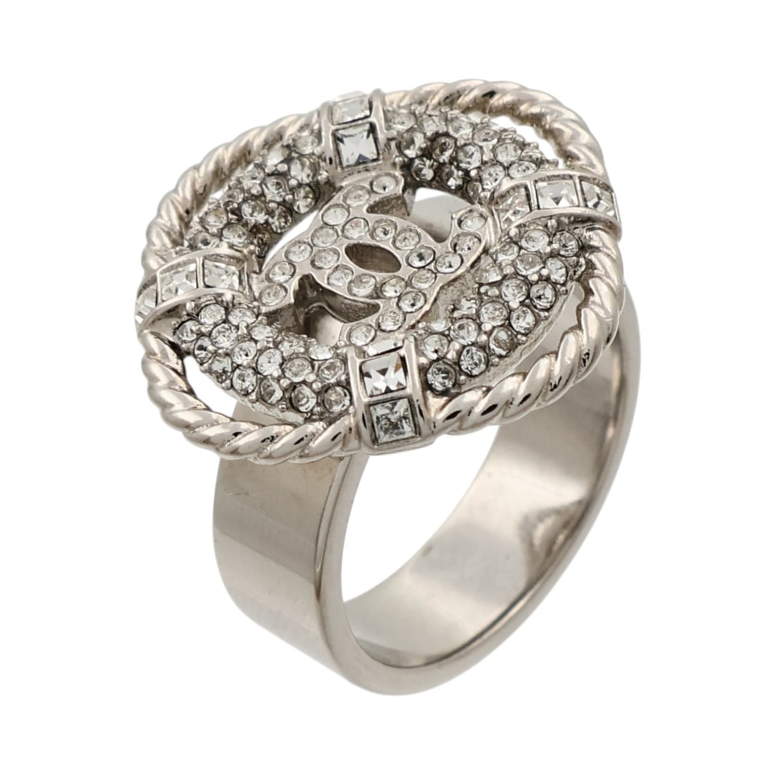 CHANEL B19 C Crystal CC Lifesaver Ring Silver Metal Strass Size 6: CHANEL B19 C Crystal CC Lifesaver Ring Silver Metal Strass Size 6 CHANEL CC Crystal Lifesaver CC Ring B19/C is a silver-toned ring made of metal and strass, presented in US size 6. It features a CC cr