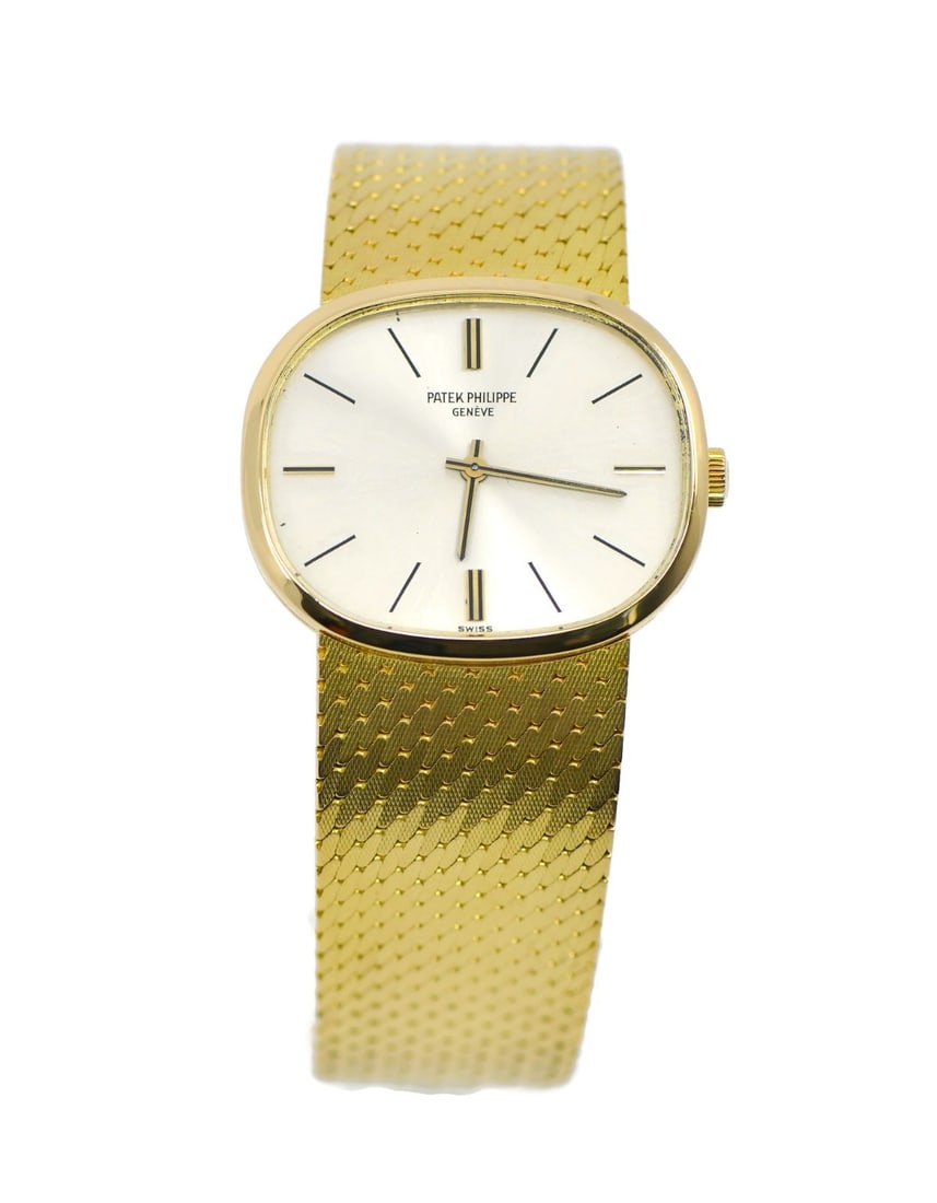 Patek Philippe Golden Ellipse 18K Yellow Gold Watch Ref 3545: Patek Philippe Golden Ellipse 18K Yellow Gold Watch Ref 3545 Experience timeless elegance with the Patek Philippe Golden Ellipse, a stunning 18K yellow gold wristwatch. This exquisite timepiece featur
