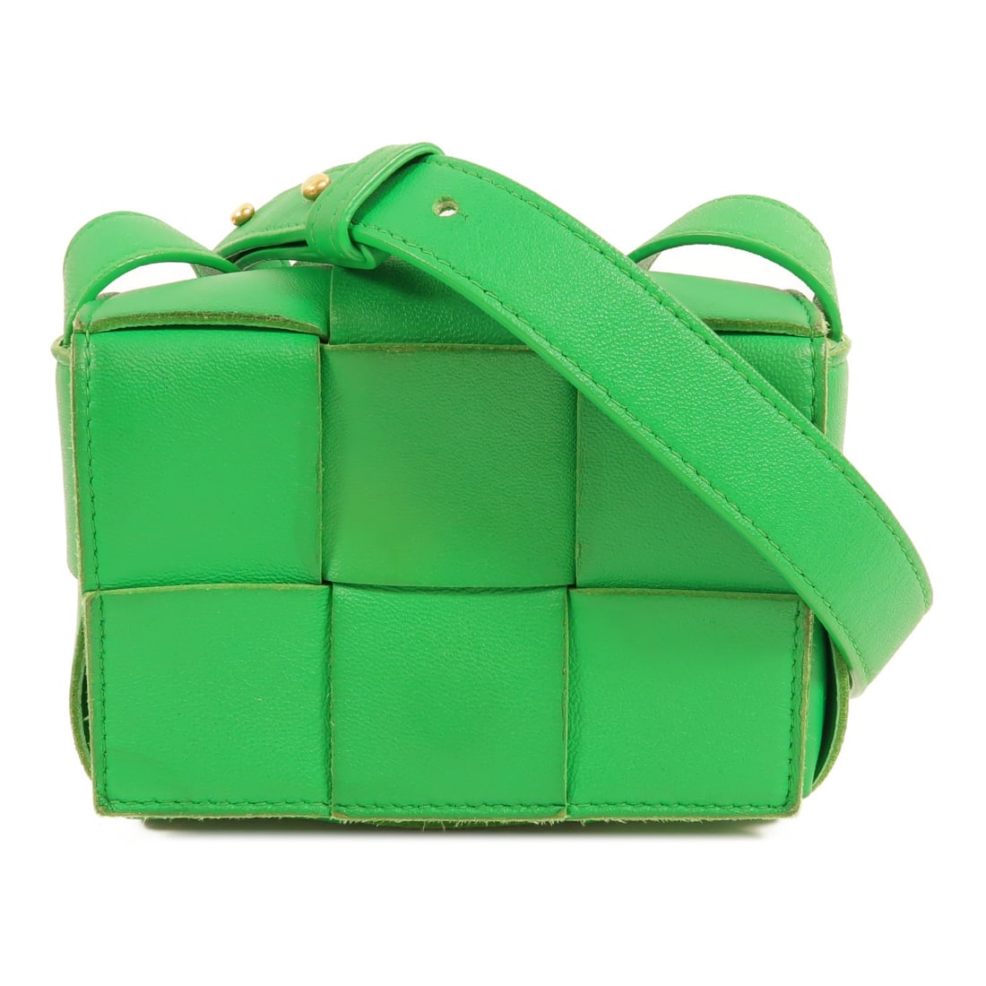 Green lambskin mini shoulder bag Bottega Veneta Cassette BV: Green lambskin mini shoulder bag Bottega Veneta Cassette BV Bottega Veneta BV Cassette Min Shoulder Bag in green lambskin leather. The bag features a magnetic pocket and one open interior pocket. It m