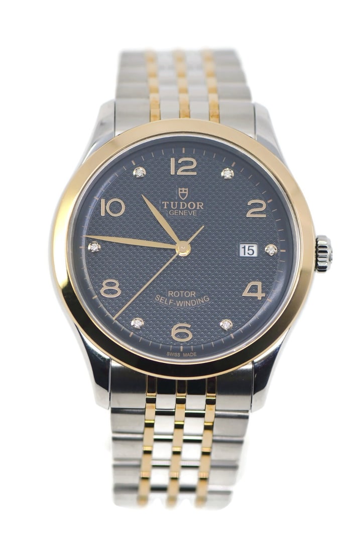 Tudor 1926 Diamond 18K Stainless Steel Watch 41mm Ref 91651: Tudor 1926 Diamond 18K Stainless Steel Watch 41mm Ref 91651 Introducing the Tudor 1926 Diamond Wristwatch, a stunning blend of 18K gold and stainless steel. This automatic timepiece features a sleek b