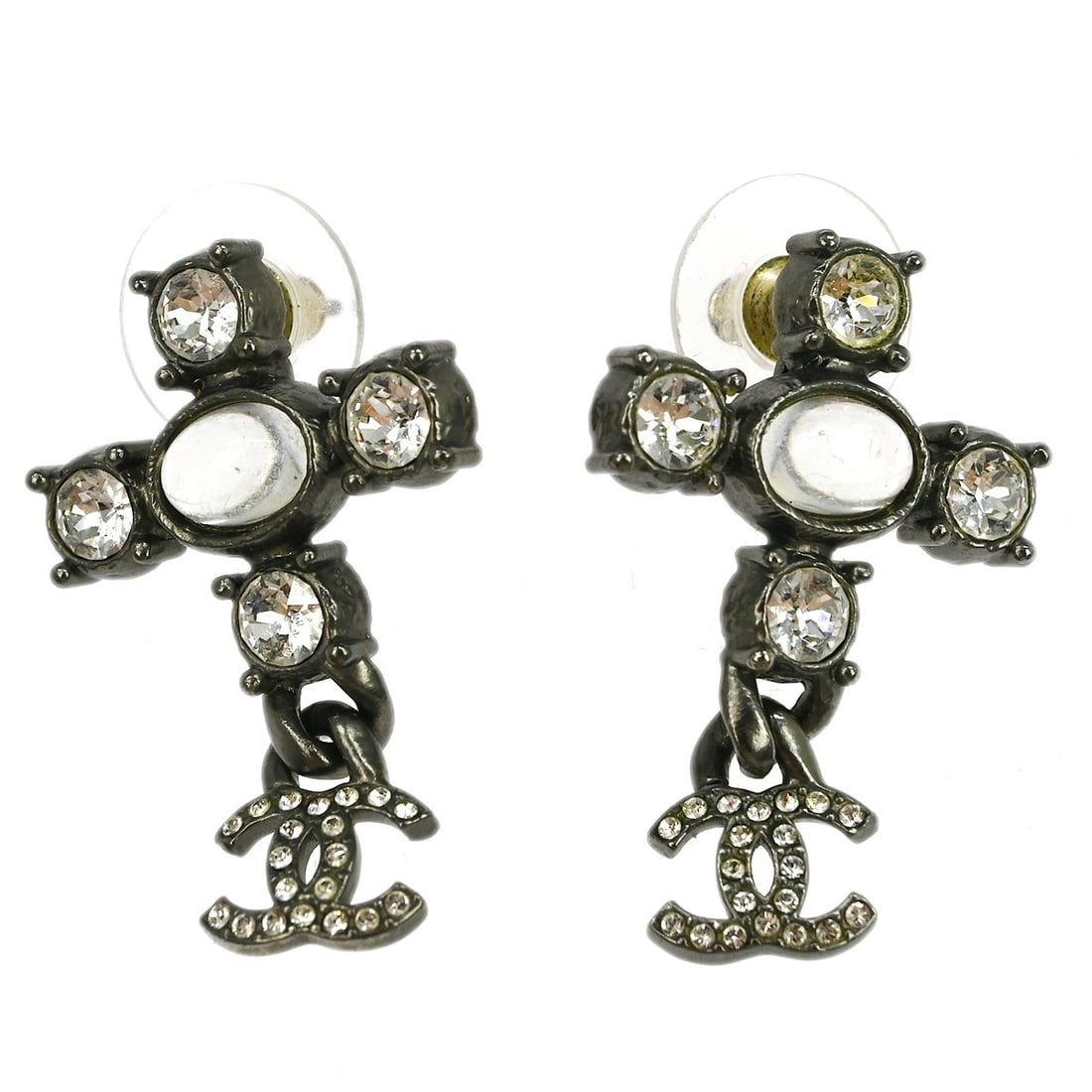 Chanel A21K Silver Plated Rhinestone Dangle Earrings: Chanel A21K Silver Plated Rhinestone Dangle Earrings Chanel dangle pierced earrings with rhinestone accents and a silver-plated finish. Made in France, this pair features a screw back pierced closure 