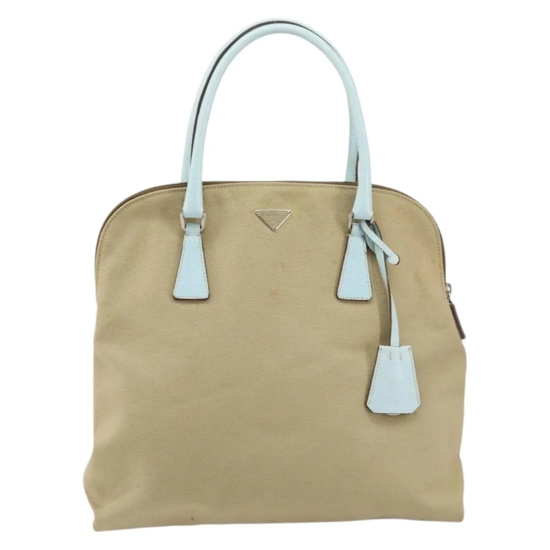 Prada Vintage Beige Canvas Handbag Made in Italy: Prada Vintage Beige Canvas Handbag Made in Italy This pre-owned Prada vintage handbag for women features beige canvas construction with metal fittings. It measures 33cm x 31cm x 1cm and was made in It