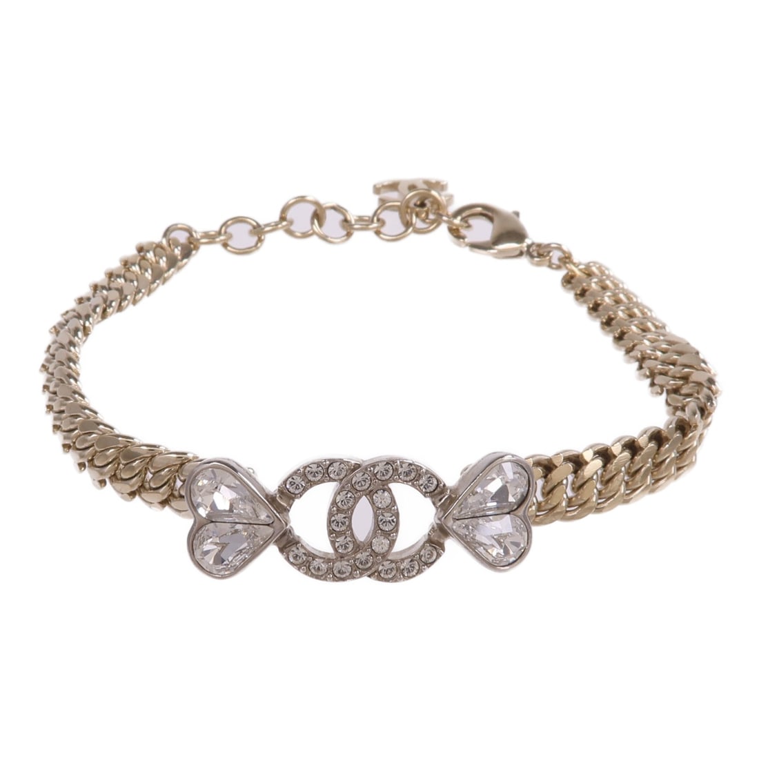 CHANEL CC Gold and Silver Tone Metal Bracelet: CHANEL CC Gold and Silver Tone Metal Bracelet This CHANEL CC bracelet features a sophisticated design crafted in gold-toned metal. Made in France, it is suited for women and showcases the iconic CC mo