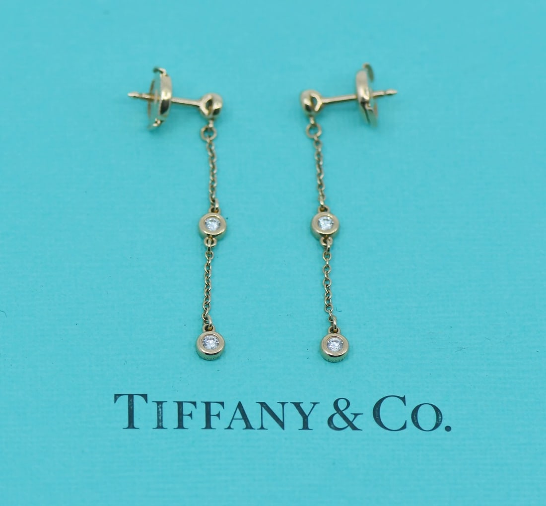 Tiffany & Co Elsa Peretti 18K Rose Gold Diamond Drop Earrings: Tiffany & Co Elsa Peretti 18K Rose Gold Diamond Drop Earrings Elevate your elegance with these exquisite Tiffany & Co. Elsa Peretti Diamonds By Yard earrings. Crafted from luxurious 18K rose gold, the