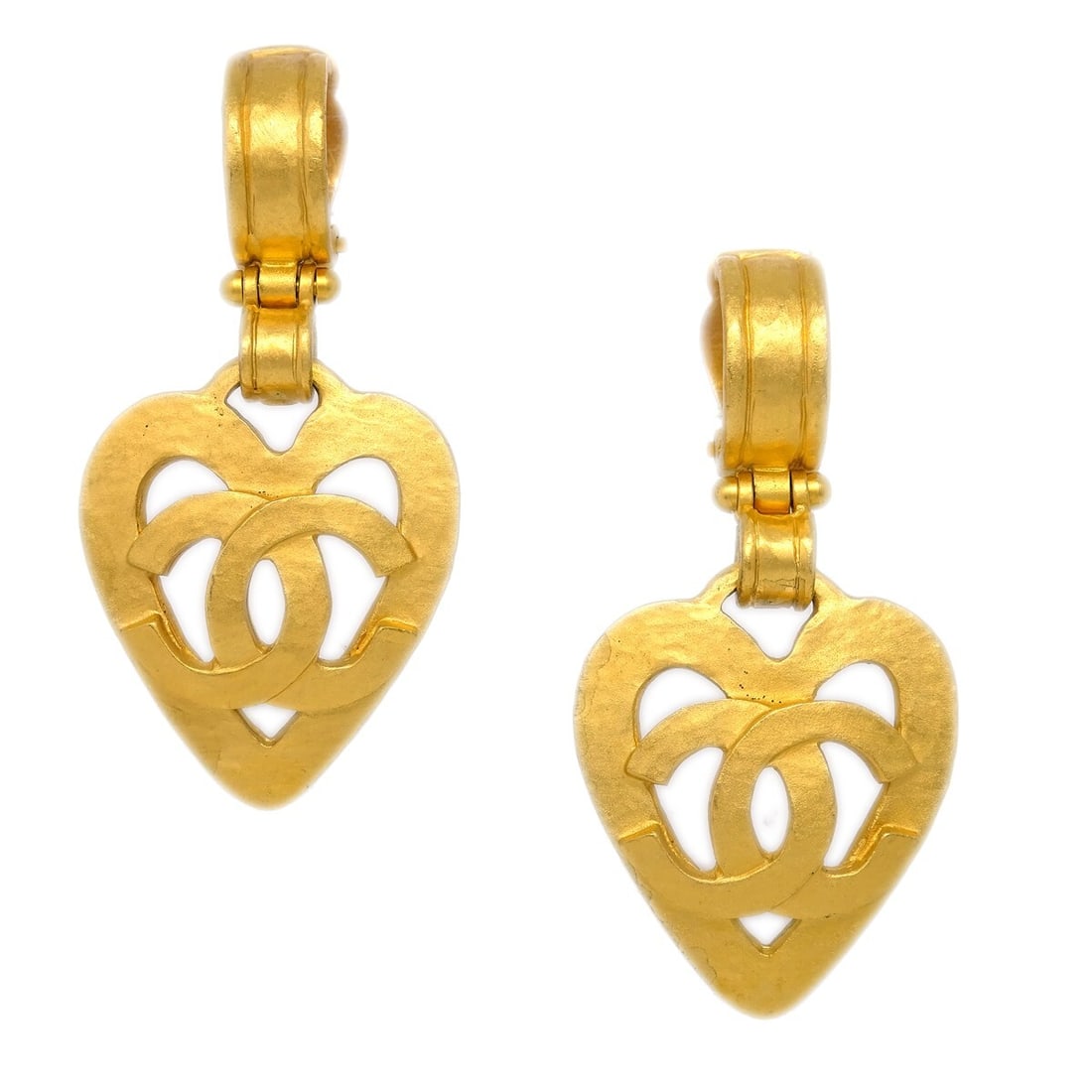 Chanel 95P Gold Plated Heart Drop Clip On Earrings: Chanel 95P Gold Plated Heart Drop Clip On Earrings Chanel dangle heart clip-on earrings in gold plated metal. Made in France, this pair features a drop design with heart motifs and comes with the orig