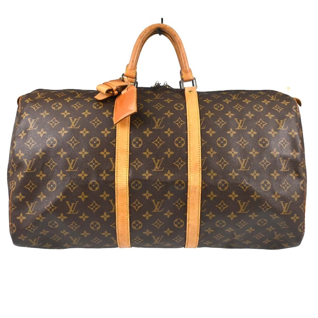 Louis Vuitton Keepall 55 Monogram Canvas Duffle Bag M41424: Louis Vuitton Keepall 55 Monogram Canvas Duffle Bag M41424 Vintage Louis Vuitton Keepall 55 travel handbag in Monogram canvas with leather trim and double handles. This extra large duffle-style bag fe