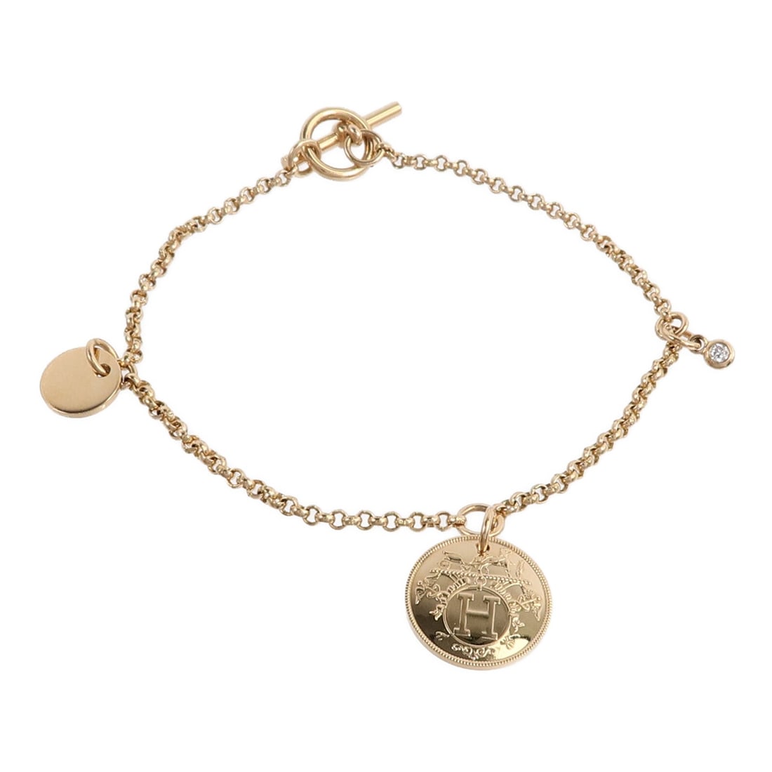 Hermes Ex-Libris bracelet in 18K pink gold with diamonds: Hermes Ex-Libris bracelet in 18K pink gold with diamonds Hermes Ex-Libris diamond bracelet in 18K pink gold, featuring a gold-on-gold color presentation and a motif measuring 13 mm x 13 mm. The bracel