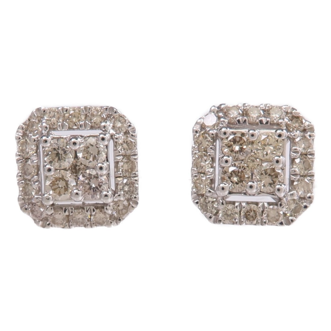 Pierced Diamond Earrings in 18K White Gold by JEWELRY: Pierced Diamond Earrings in 18K White Gold by JEWELRY Diamond pierced earrings in 18K white gold with clear color accents. The earrings feature diamond stones and are described as women's regular size