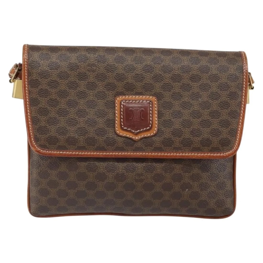 Celine Vintage Macadam Brown Canvas Leather Shoulder Bag: Celine Vintage Macadam Brown Canvas Leather Shoulder Bag This vintage Celine Macadam shoulder bag for women features a brown canvas body with leather accents. It measures 22cm x 17cm x 1.5cm and is ma
