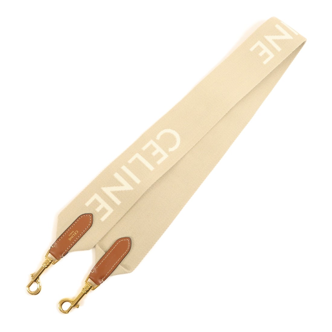CELINE Canvas Shoulder Strap Beige with Storage Bag: CELINE Canvas Shoulder Strap Beige with Storage Bag A CELINE shoulder strap in beige canvas with gold-tone hardware. It comes with a storage bag and is listed in very good AB condition. Date code F-AN