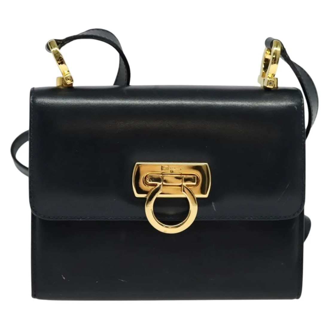Black Leather Shoulder Bag Salvatore Ferragamo Gancini Flap: Black Leather Shoulder Bag Salvatore Ferragamo Gancini Flap This Salvatore Ferragamo Gancini Flap Shoulder bag is crafted from black leather and designed for female use. It features a flap closure wit