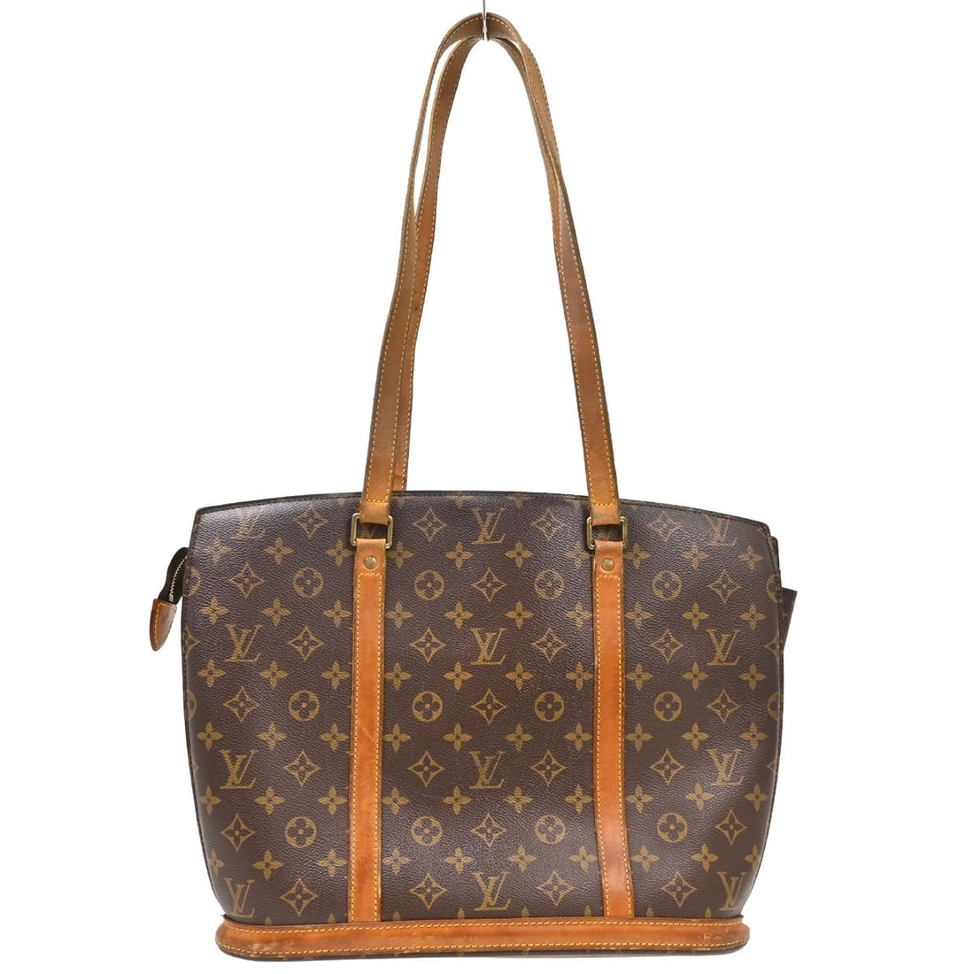 Louis Vuitton Babylone Monogram Canvas Tote Bag M51102: Louis Vuitton Babylone Monogram Canvas Tote Bag M51102 Vintage Louis Vuitton Babylone hand tote bag in Monogram canvas and leather, featuring a zip closure, double handles, and a large tote style. The