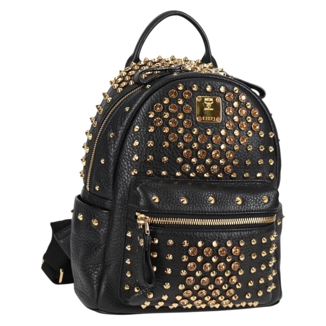 MCM Vicetos Leather Backpack Black Gold Tone with Dust Bag: MCM Vicetos Leather Backpack Black Gold Tone with Dust Bag MCM Vicetos Studs Backpack in black and gold leather. This backpack includes a dust bag and was made in Korea. The item is graded AB and is d