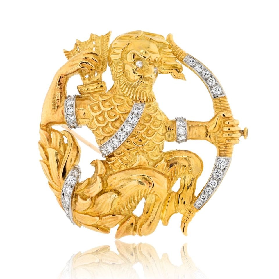 David Webb Sagittarius Diamond Brooch in Platinum and 18K Yellow Gold: David Webb Sagittarius Diamond Brooch in Platinum and 18K Yellow Gold This exquisite David Webb brooch, crafted from platinum and 18K yellow gold, features a stunning Sagittarius design adorned with 3