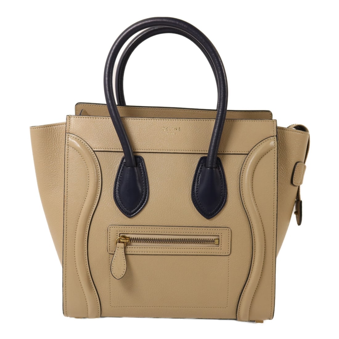 CELINE Micro Luggage Tote in Beige Navy Calfskin F-LA-0154: CELINE Micro Luggage Tote in Beige Navy Calfskin F-LA-0154 CELINE Micro Luggage Tote Bag in beige and navy calfskin leather, made in France. This tote features a regular size profile, beige frame colo