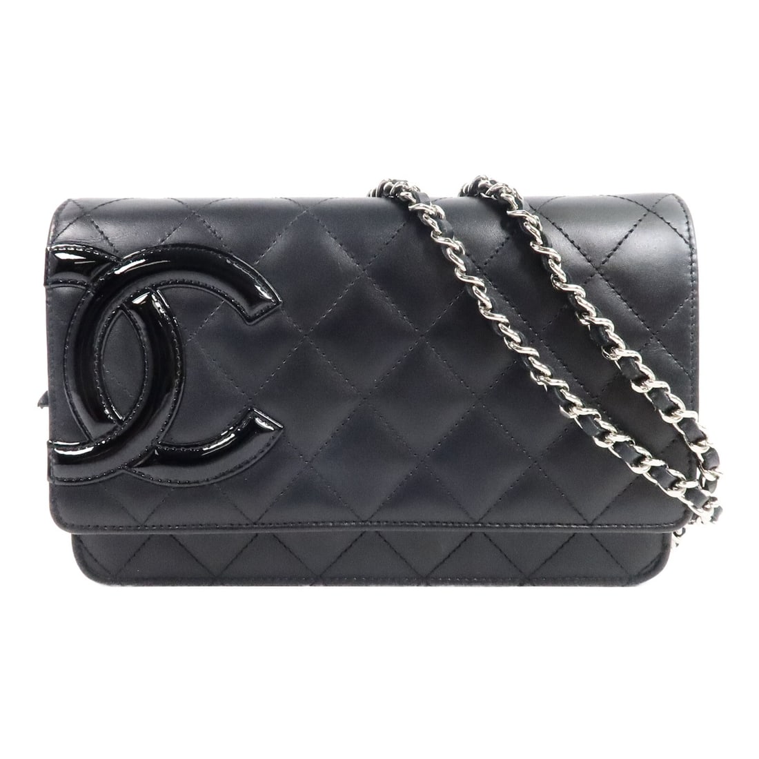 CHANEL WOC shoulder bag in black calfskin with CC and SHW: CHANEL WOC shoulder bag in black calfskin with CC and SHW CHANEL wallet on chain shoulder bag in black calfskin leather. It features a CC design, black hardware, and a practical interior layout with m