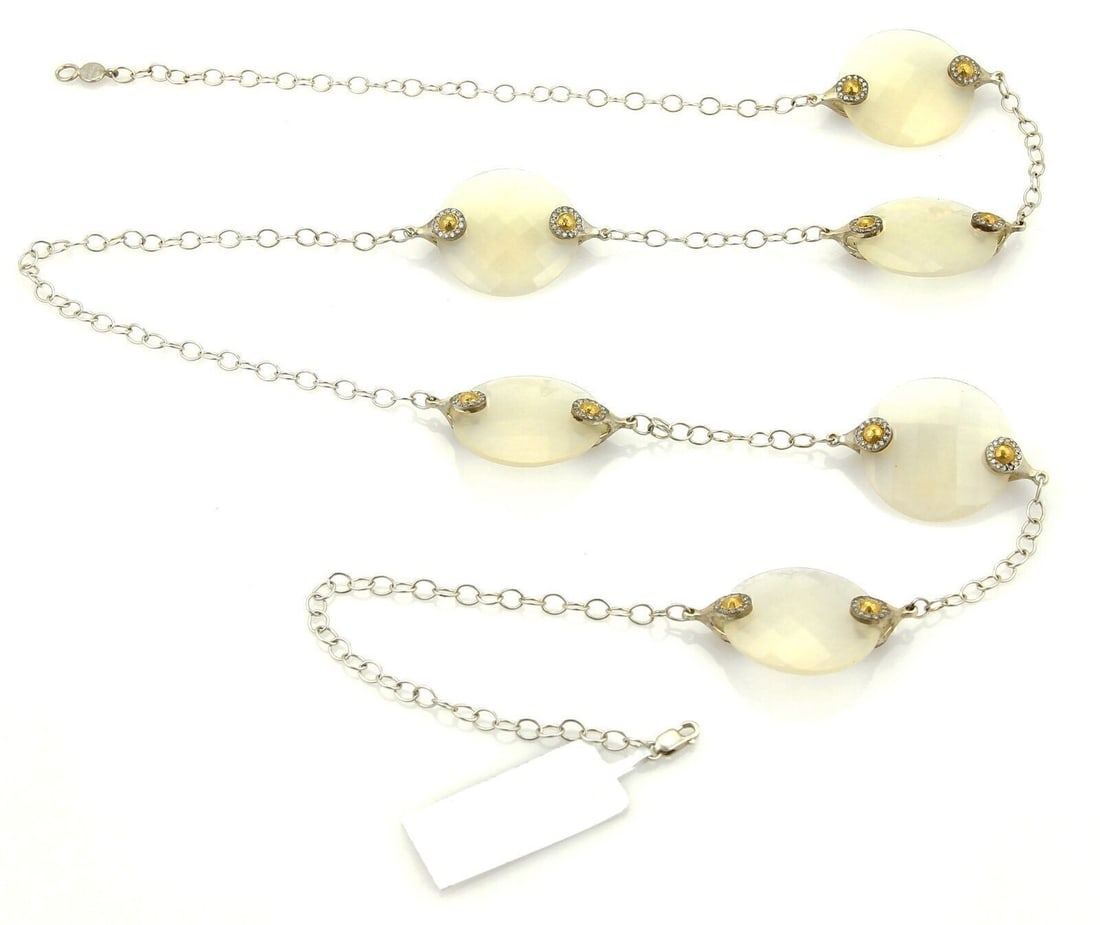 Gurhan NOKTA DISCUS Sterling Silver Necklace with White Quartz and Diamonds: Gurhan NOKTA DISCUS Sterling Silver Necklace with White Quartz and Diamonds Gurhan NOKTA DISCUS necklace crafted in sterling silver with 24k gold accents. It features white quartz discs accented with 