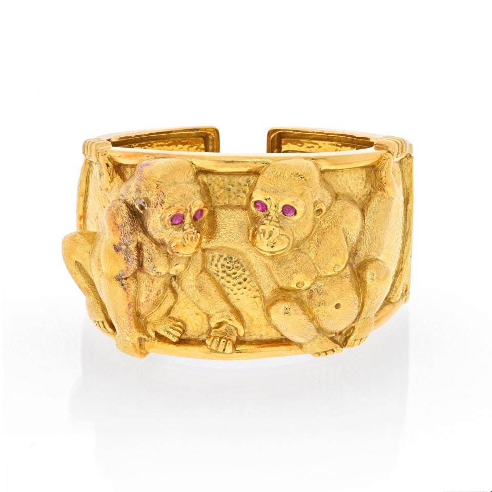 David Webb Platinum 18K Yellow Gold Apes Cuff Bracelet: David Webb Platinum 18K Yellow Gold Apes Cuff Bracelet This exquisite David Webb bracelet features a striking design crafted from a combination of Platinum and 18K Yellow Gold. The centerpiece of the 