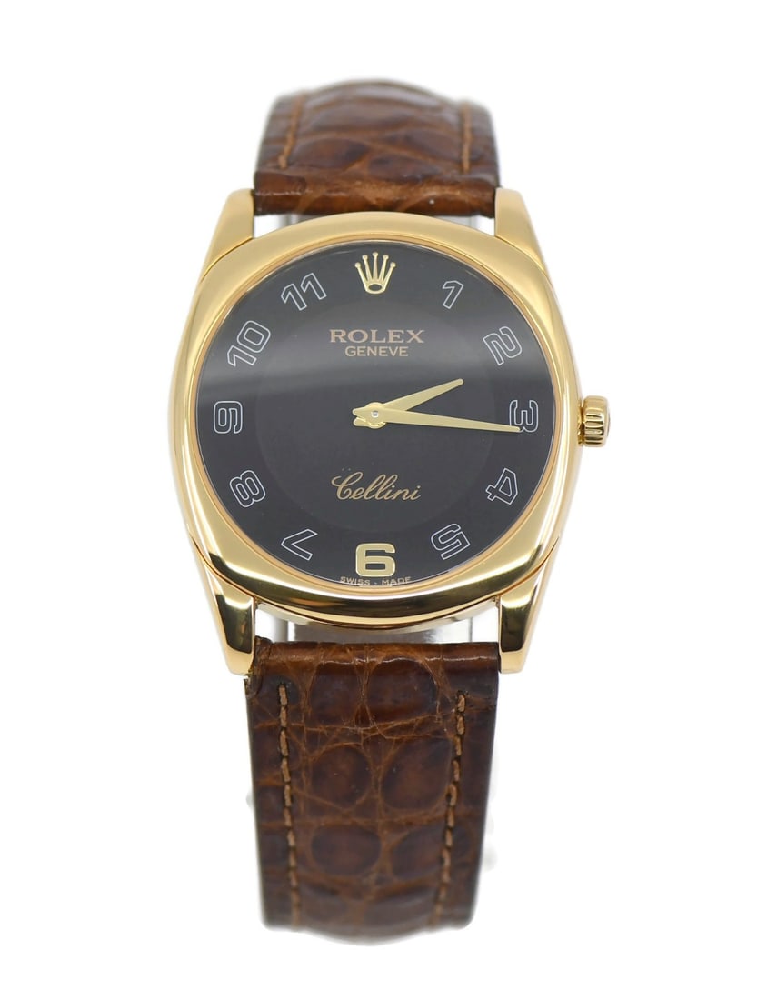 Rolex Cellini Danaos wristwatch 18K yellow gold ref 4233 box: Rolex Cellini Danaos wristwatch 18K yellow gold ref 4233 box A pre-owned Rolex Cellini Danaos wristwatch in 18K yellow gold with a round, polished gold case and black analog dial. It features a mechan