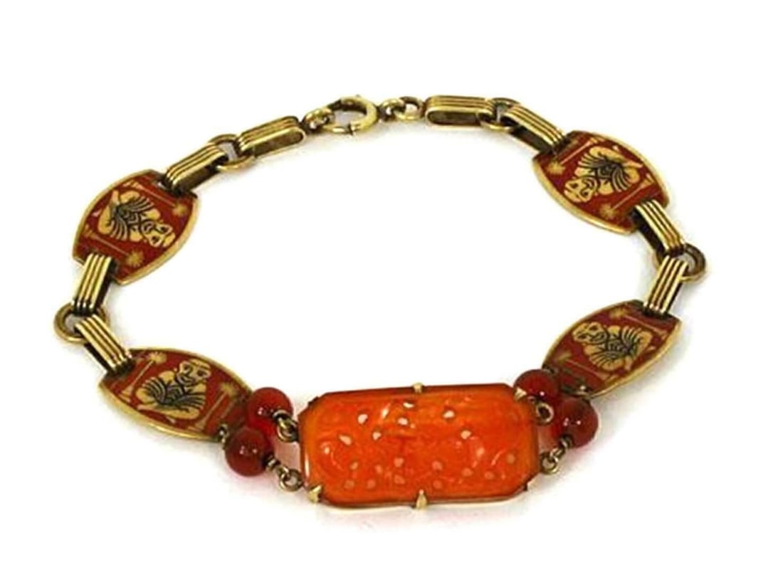 Vintage 14k Yellow Gold Buddha Link Bracelet with Carnelian Enamel: Vintage 14k Yellow Gold Buddha Link Bracelet with Carnelian Enamel Vintage estate Buddha motif link bracelet crafted in 14k yellow gold with a carnelian centerpiece and enamel detailing. The bracelet 
