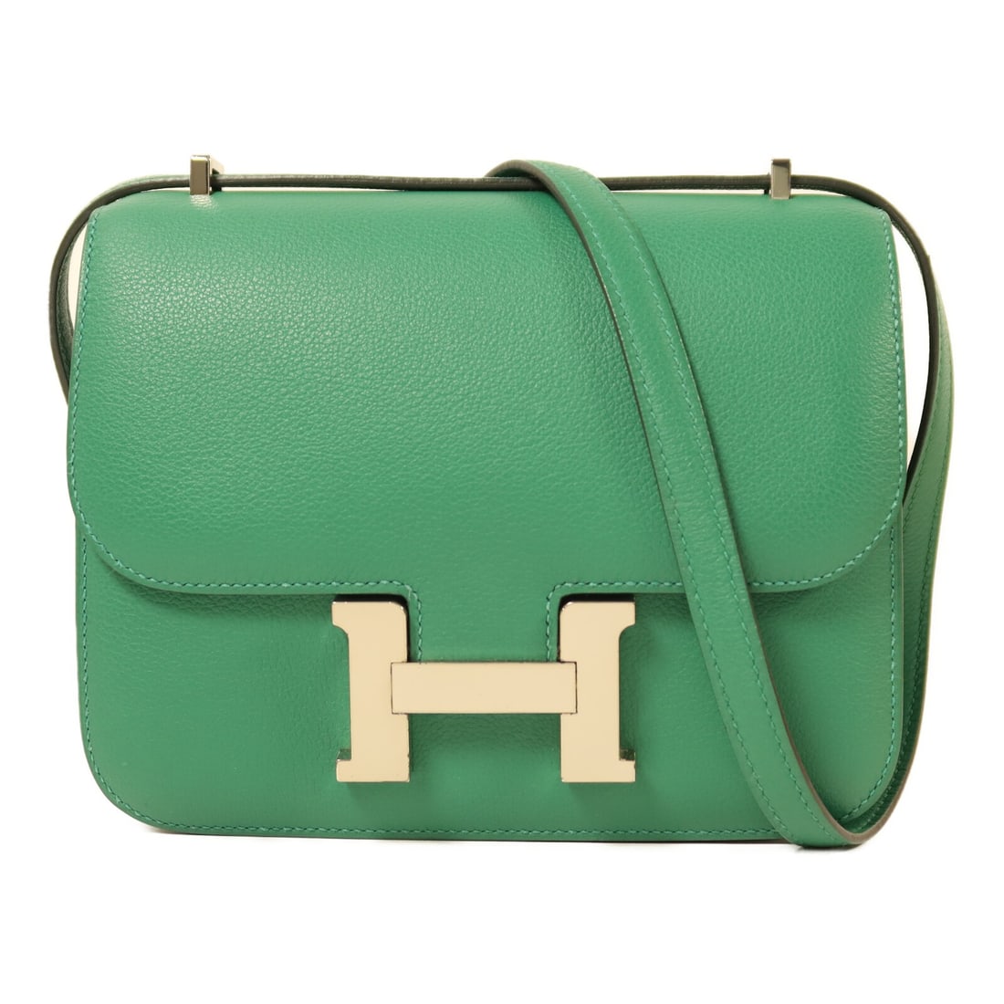 Hermes Constance Mini Evercolor Calfskin Shoulder Bag Vert Vertigo PHW: Hermes Constance Mini Evercolor Calfskin Shoulder Bag Vert Vertigo PHW Hermes PHW Constance Mini Shoulder Bag in Evercolor Vert Vertigo. This bag features a flap closure, two open interior pockets, an