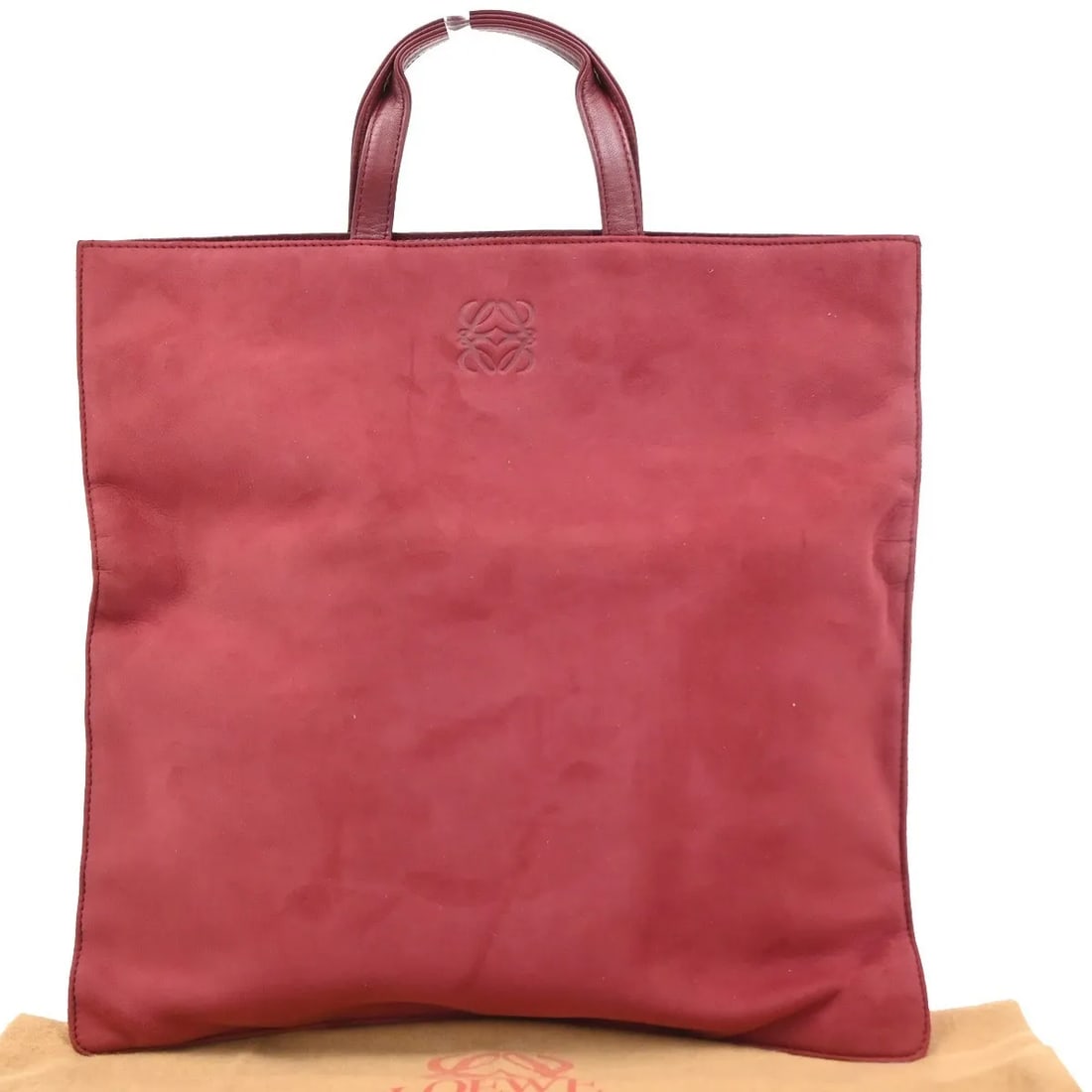 Loewe Anagram Tote Red Suede Handbag: Loewe Anagram Tote Red Suede Handbag Loewe Anagram Tote in red suede, designed for women. Made in Spain, this tote measures 33 cm x 33 cm x 0.5 cm. The item is in good condition with light wear, light
