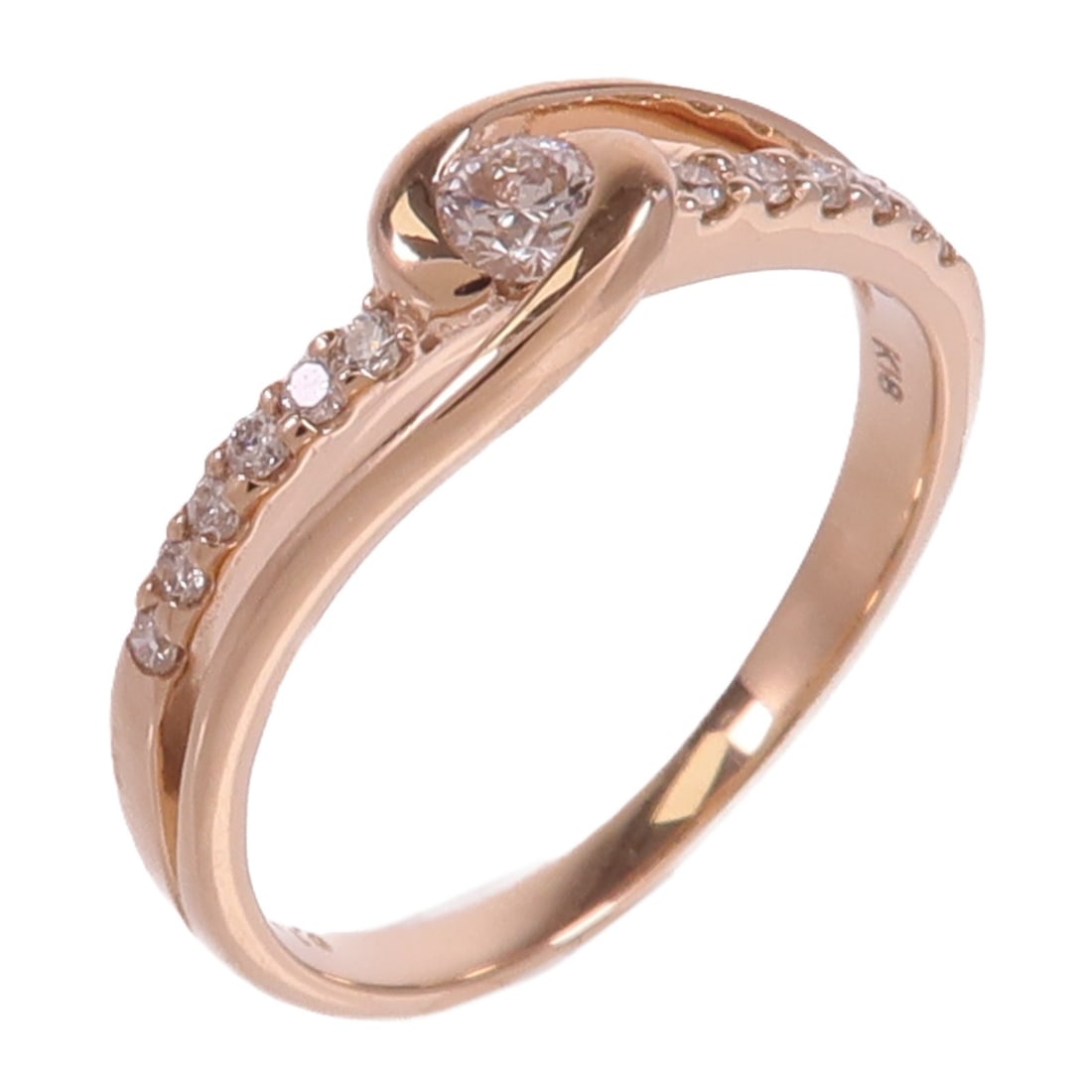 18K Rose Gold Diamond Ring Size 5.5 1.16ct 0.10ct: 18K Rose Gold Diamond Ring Size 5.5 1.16ct 0.10ct A diamond ring in 18K pink gold with clear diamonds. The ring is size US 5.5 and has a ring width of 1.5-2 mm (0.6 in). Condition is AB: Very Good. Sp