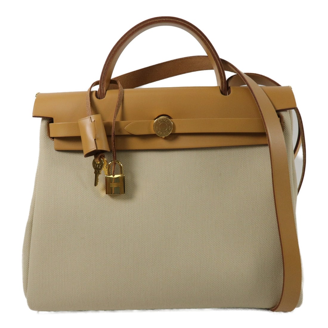 Hermes Herbag PM canvas 2 way shoulder handbag Fauve: Hermes Herbag PM canvas 2 way shoulder handbag Fauve A Hermes Herbag PM 2 Way Shoulder Bag Handbag in canvas Fauve, presented in very good AB condition. It features a two-way design with handle and sh