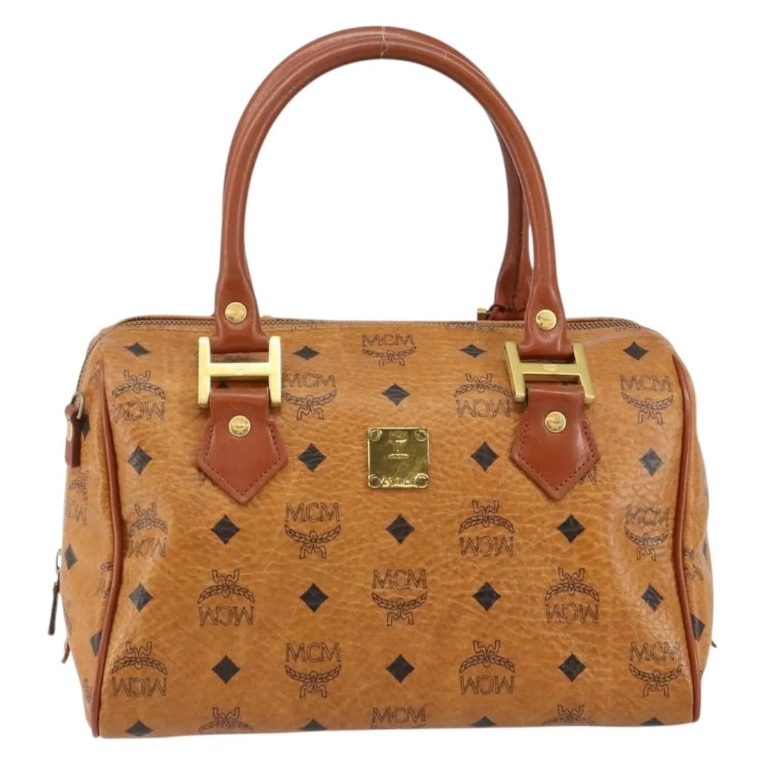 MCM Visetos Logogram Leather Brown Handbag: MCM Visetos Logogram Leather Brown Handbag MCM Visetos logogramme leather item in brown for women. Made in Germany, this piece is in good condition with visible wear from use. Noted wear includes loss