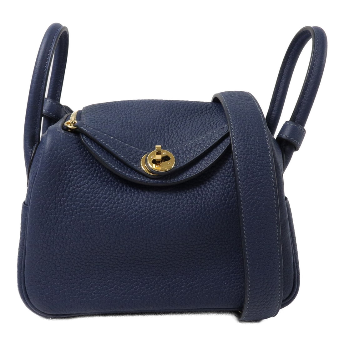 Hermes Mini Lindy Taurillon Clemence Shoulder Bag Blue De Prusse: Hermes Mini Lindy Taurillon Clemence Shoulder Bag Blue De Prusse A Hermes Mini Lindy 2 Way Shoulder Bag in Taurillon Clemence leather and calfskin, presented in Blue de Prusse with a 2-way carry desig