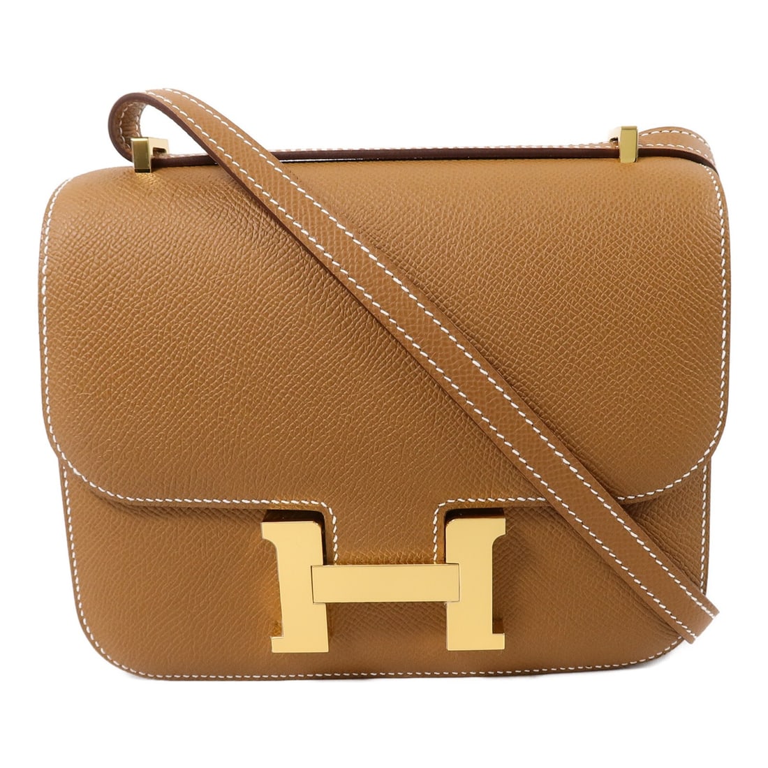 Hermes Constance Mini Epsom Calfskin Shoulder Bag Gold Brown: Hermes Constance Mini Epsom Calfskin Shoulder Bag Gold Brown A Hermes Constance Mini shoulder bag in Gold x Brown, crafted from Epsom leather and calfskin (cowhide). It features a flap closure and an 