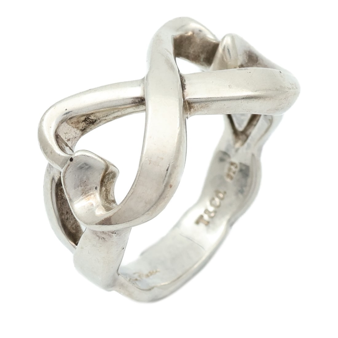Tiffany Co Double Heart Sterling Silver Ring Size 5: Tiffany Co Double Heart Sterling Silver Ring Size 5 Tiffany & Co. double heart ring in silver 925, designed for women and sized US 5. The ring has a silver color, a regular size type, and a no-stone d