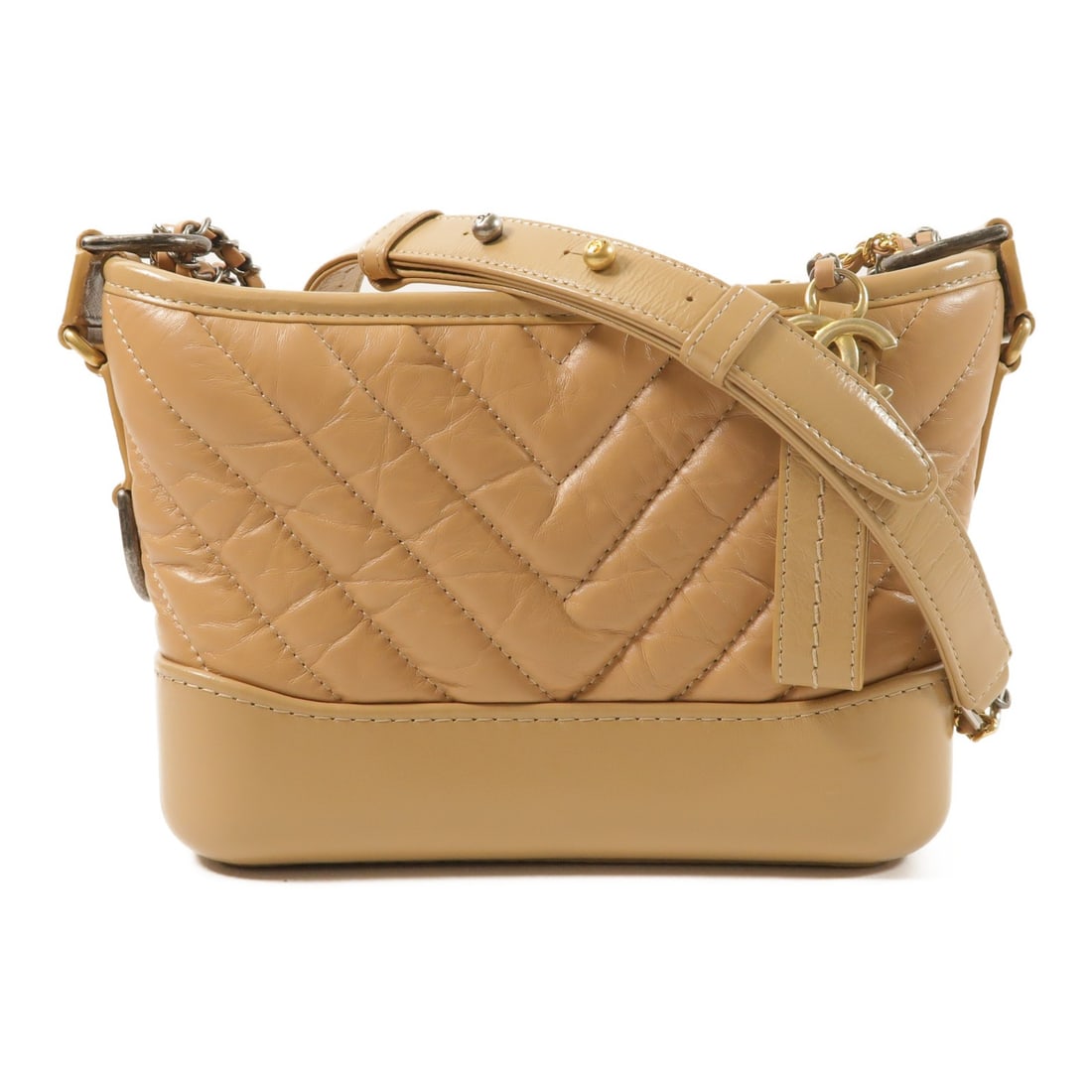 CHANEL Gabrielle Small Beige Calfskin CC Chain Shoulder Bag: CHANEL Gabrielle Small Beige Calfskin CC Chain Shoulder Bag A CHANEL CC Gabrielle Small Chain Shoulder Bag in beige calfskin leather. This regular-size women's shoulder bag features a beige exterior a