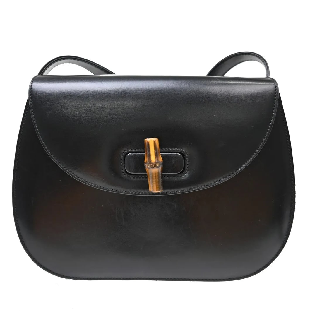 Gucci Vintage Lady Lock Flap Black Leather Handbag: Gucci Vintage Lady Lock Flap Black Leather Handbag Vintage Gucci Lady Lock Flap bag in black leather, made in Italy. It is described as being in very good condition, with light scratching on the exter