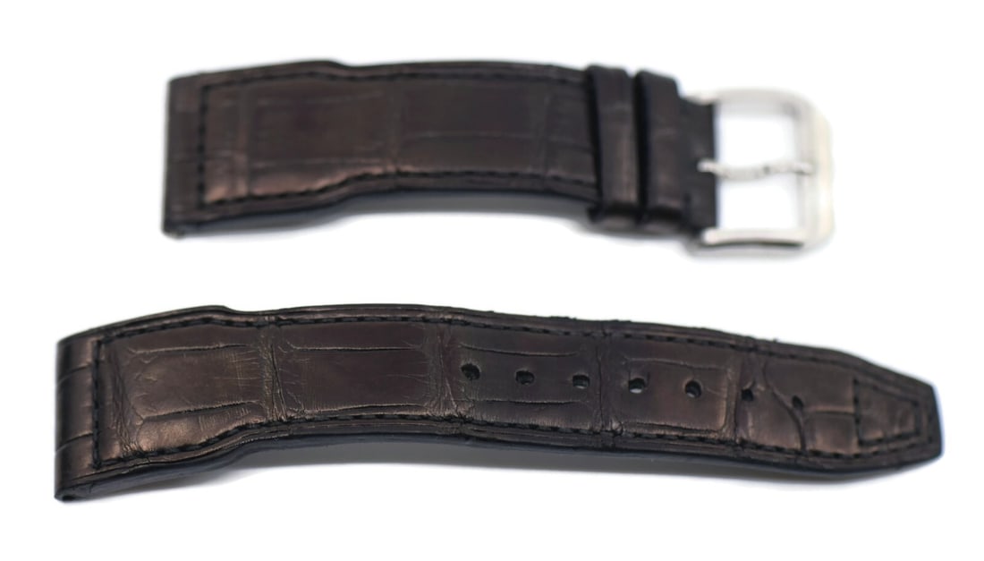 IWC Brown Leather Two-Piece Watch Strap 21mm Authentic: IWC Brown Leather Two-Piece Watch Strap 21mm Authentic Enhance your timepiece with this genuine IWC brown leather wristwatch band. This two-piece strap features a rich brown color and is crafted from 